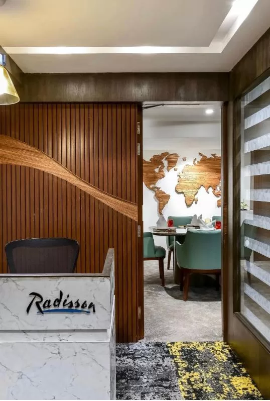 Office Interior Solutions with Sofa Upholstery and Elegant Wood Interiors